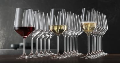 various wine glasses on bar top